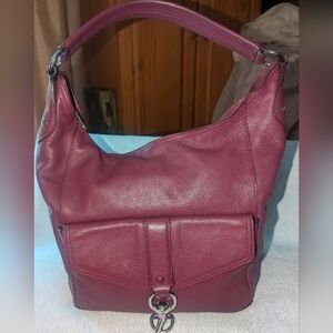 Rebecca Minkoff Hudson Moto Hobo pebbled leather shoulder bag.